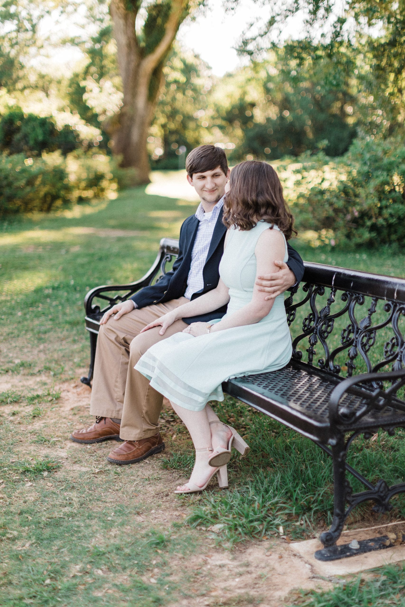 couple sit on bench