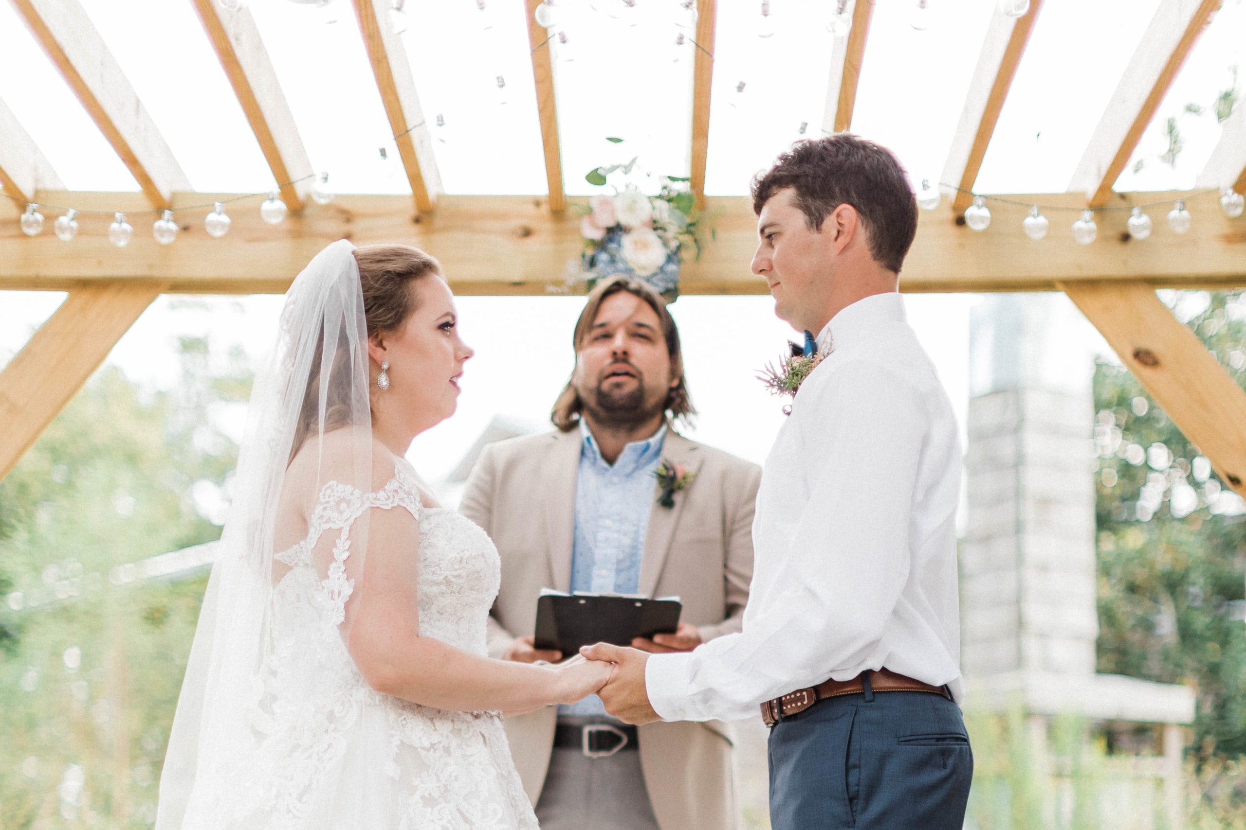 bride and groom at altar Pascagoula River Audubon Center Wedding Venue