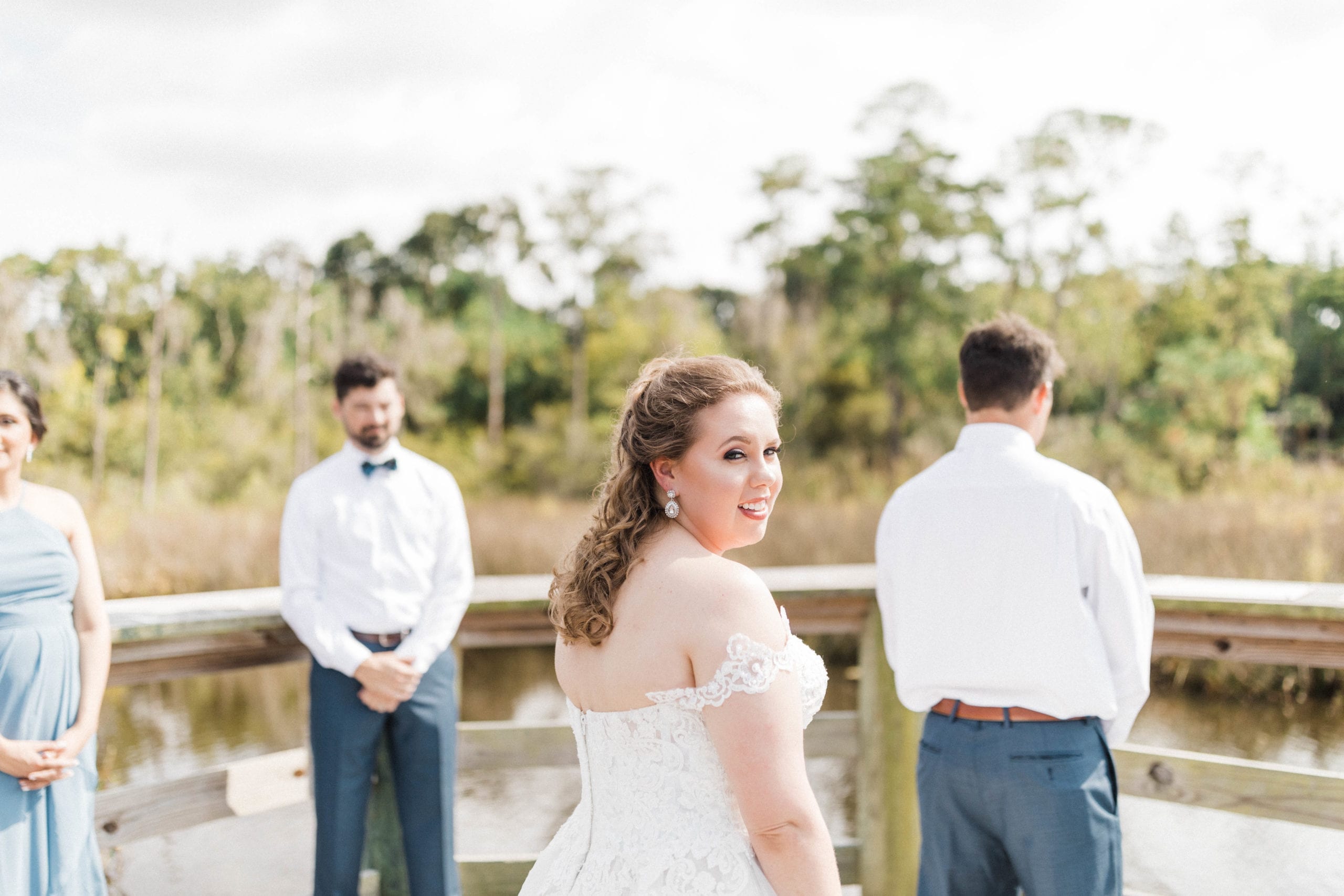 bride and groom first look at Pascagoula River Audubon Center Wedding Venue