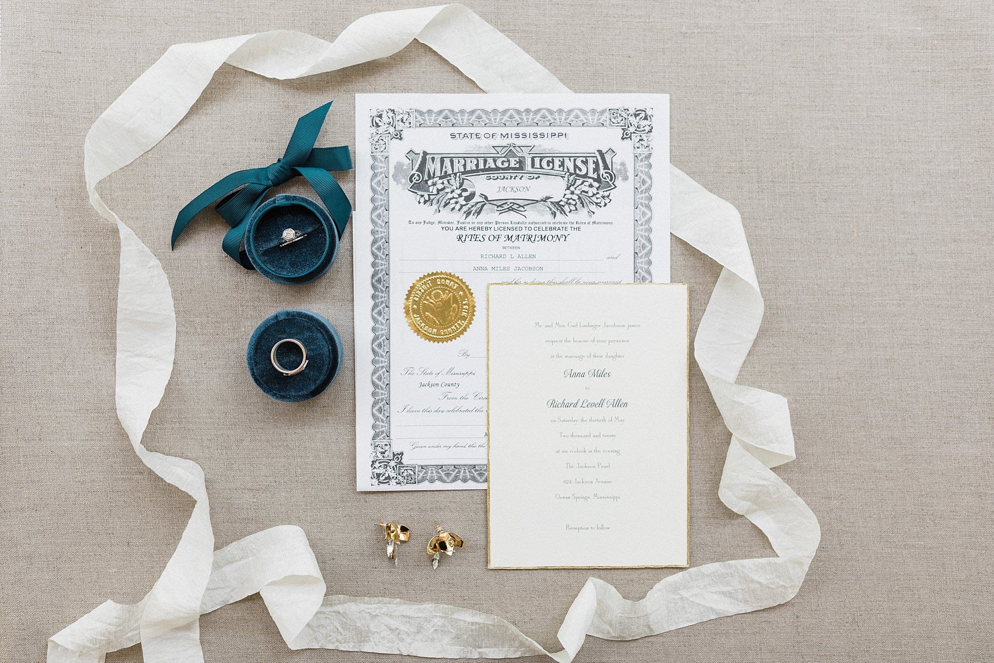 collage of wedding details including jewelry and invitation