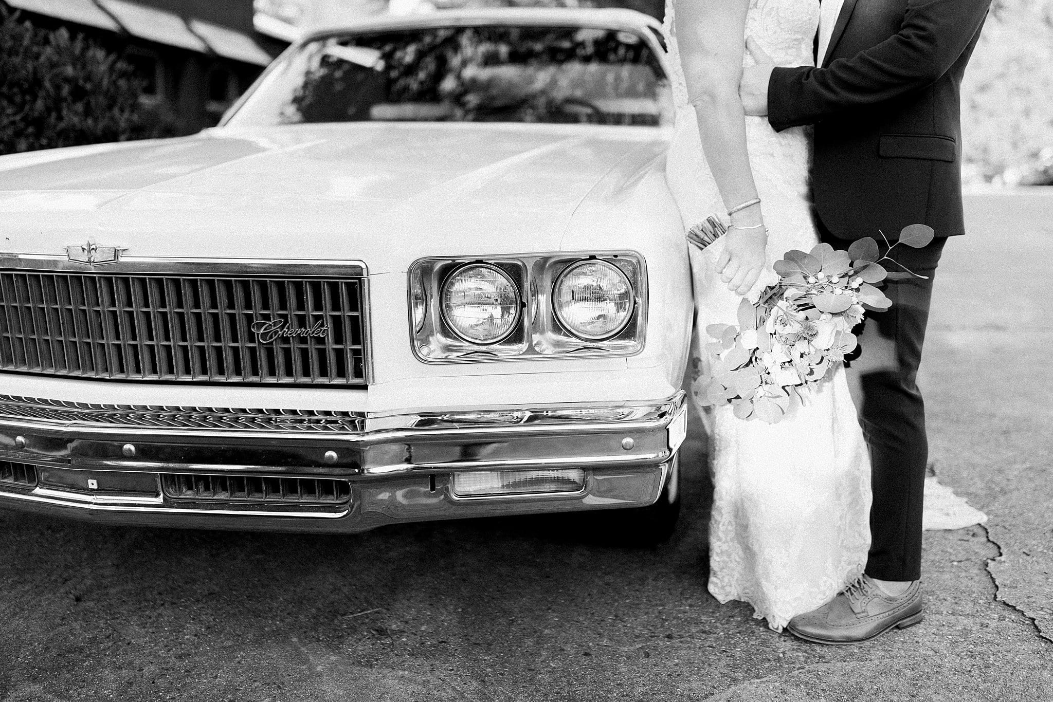black and white bride and groom by chevrolet caprice