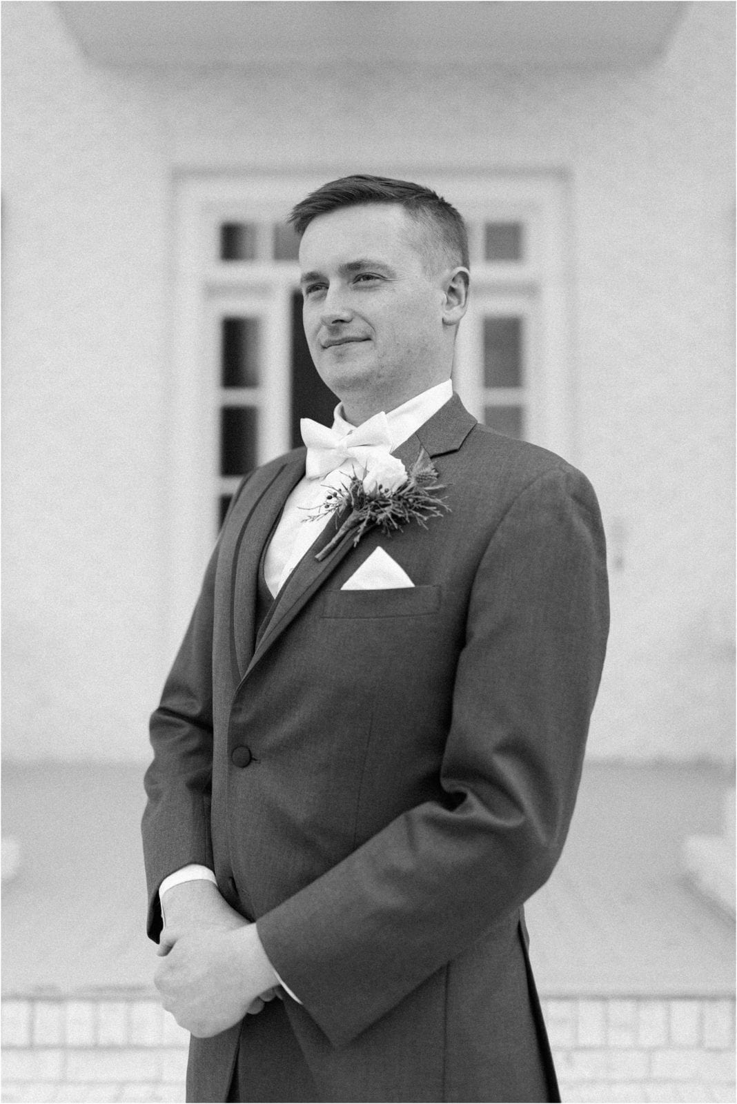 black and white portrait of the groom