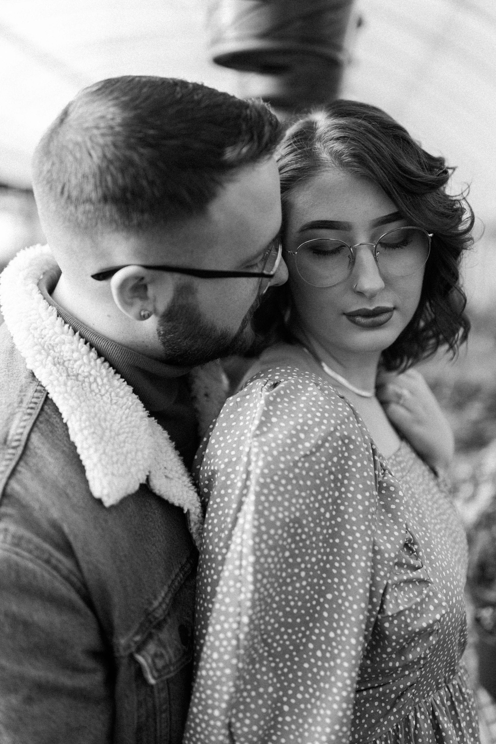 black and white image of engaged couple